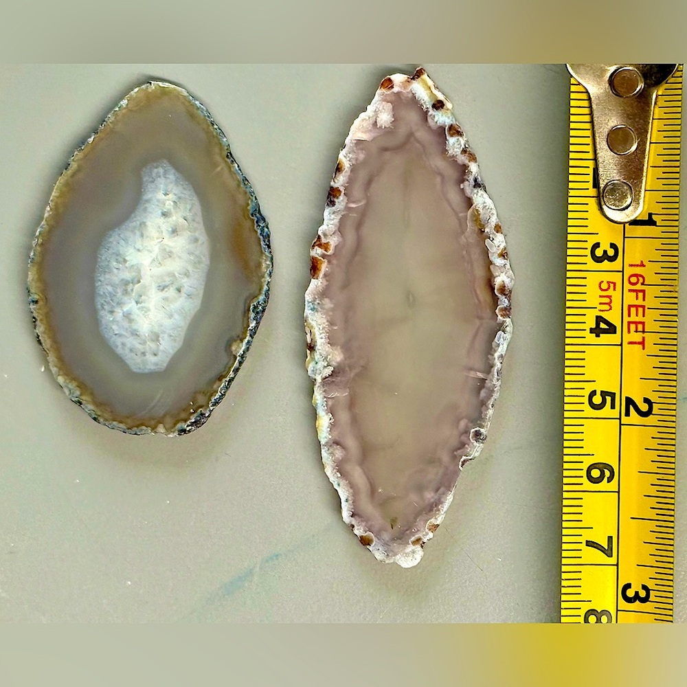 Polished agate slices, two pieces for jewelry making or crafts.